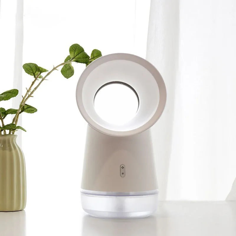 White desktop humidifier with leafless fan and night light on a wooden desk