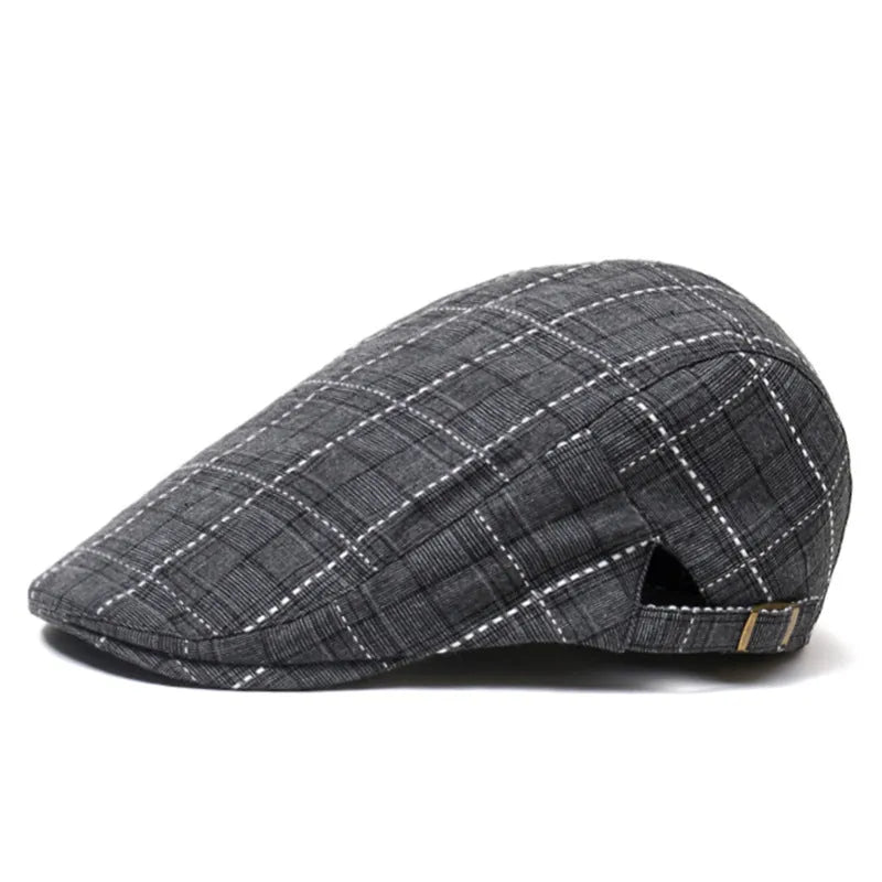 Cotton peaked cap with short brim and tapered crown in black – front view