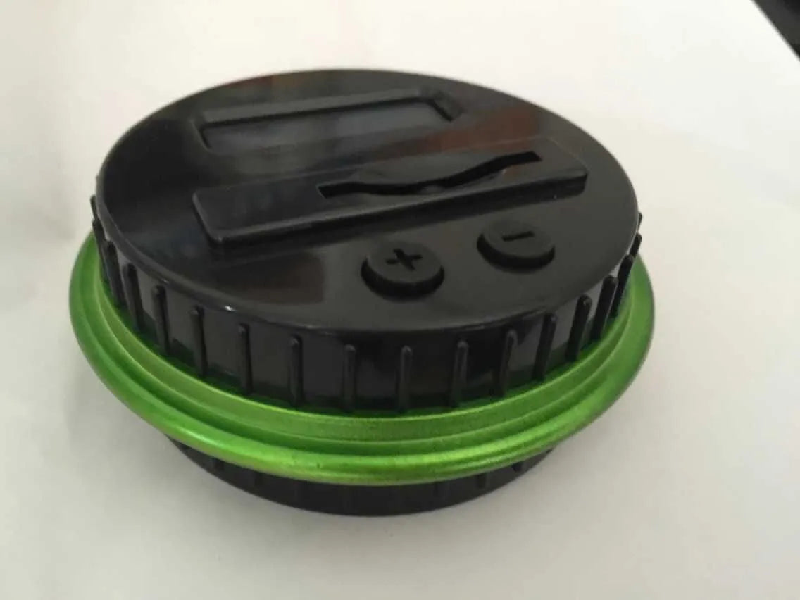 Transparent digital coin counting money box with LCD screen on black lid, 11.5cm by 20cm