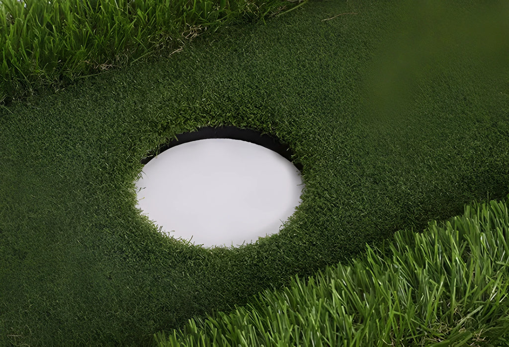 Green rectangular golf training mat with PP artificial grass turf on a cushioned EVA foam base.