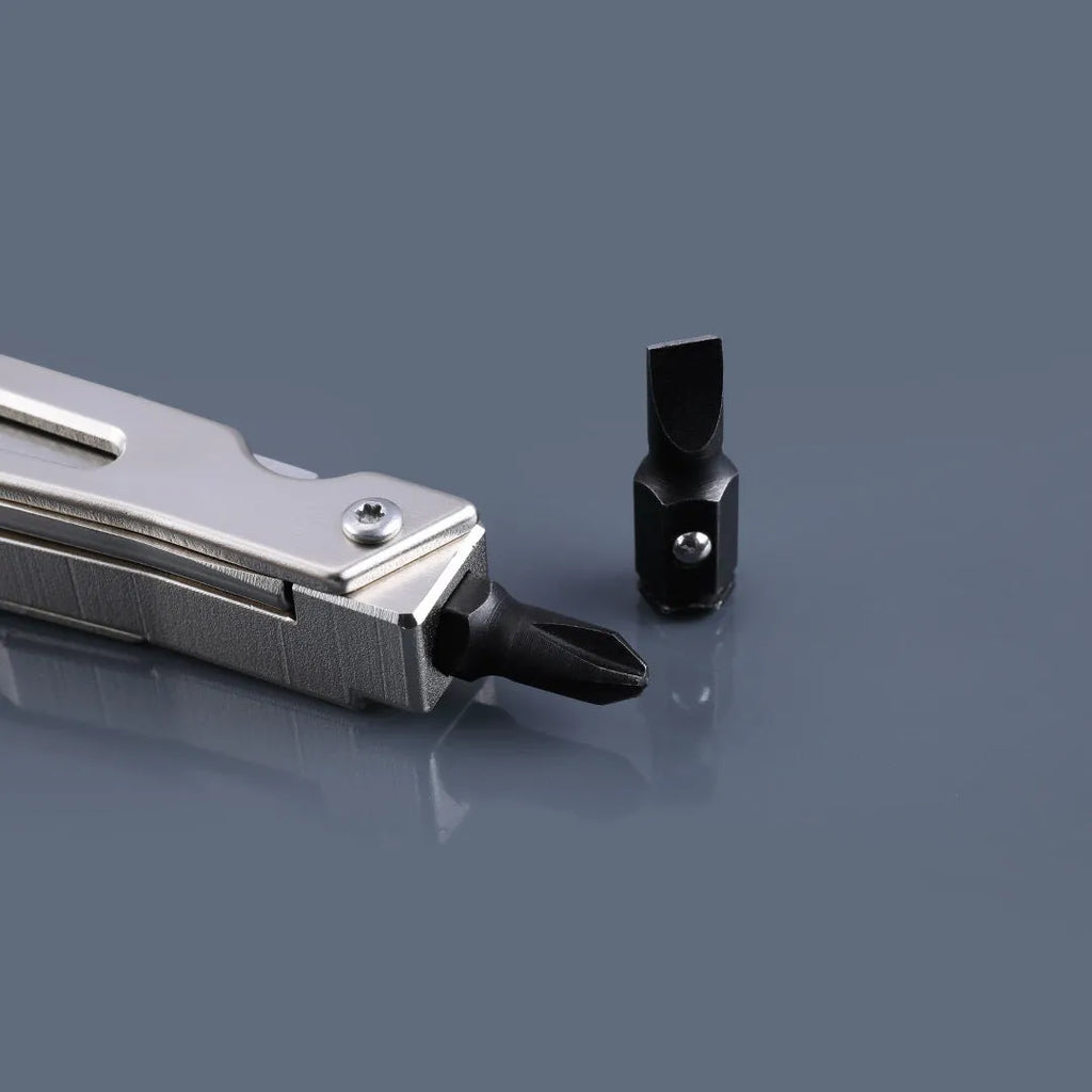 White stainless steel multi-function tool with wrench, knife, and needle-nose pliers