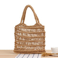Medium woven straw beach bag with open top and double soft handles in white, black, and camel colours