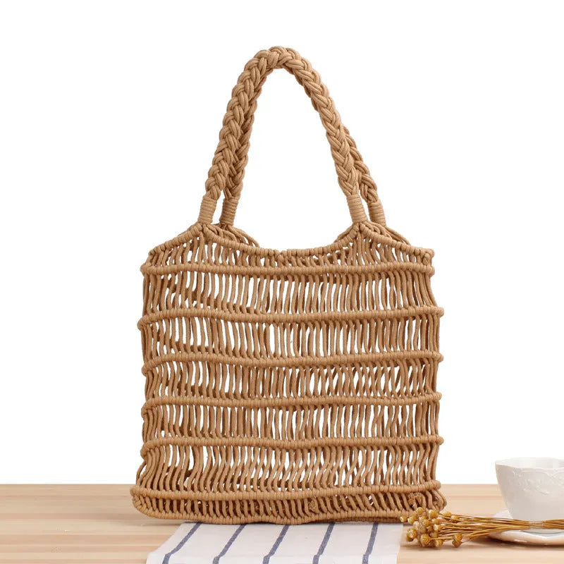 Medium woven straw beach bag with open top and double soft handles in white, black, and camel colours
