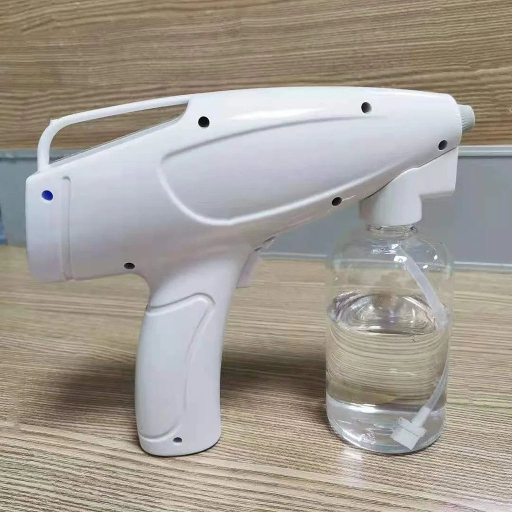 White handheld wireless electric disinfection spray gun with USB-C charging port.