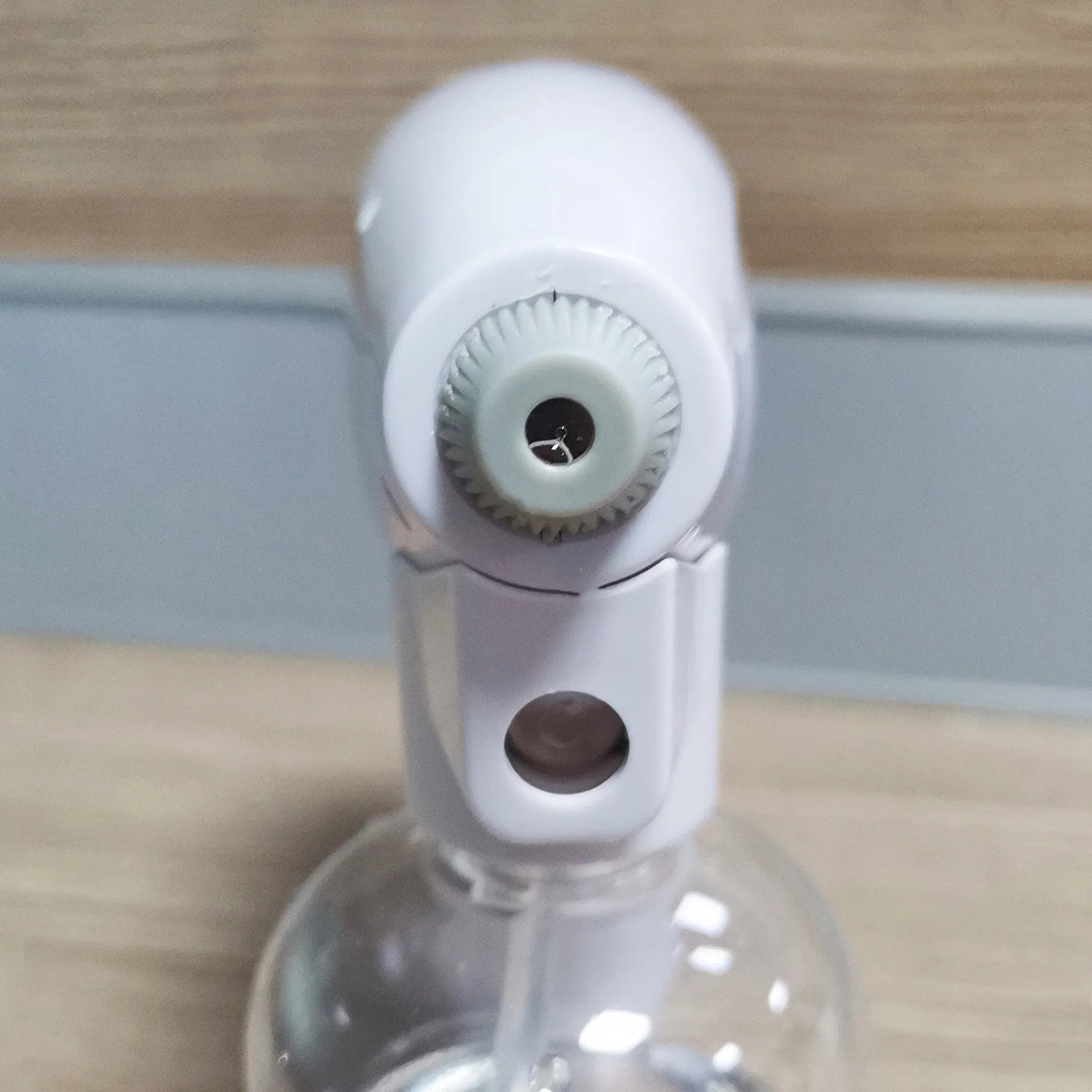White handheld wireless electric disinfection spray gun with USB-C charging port.