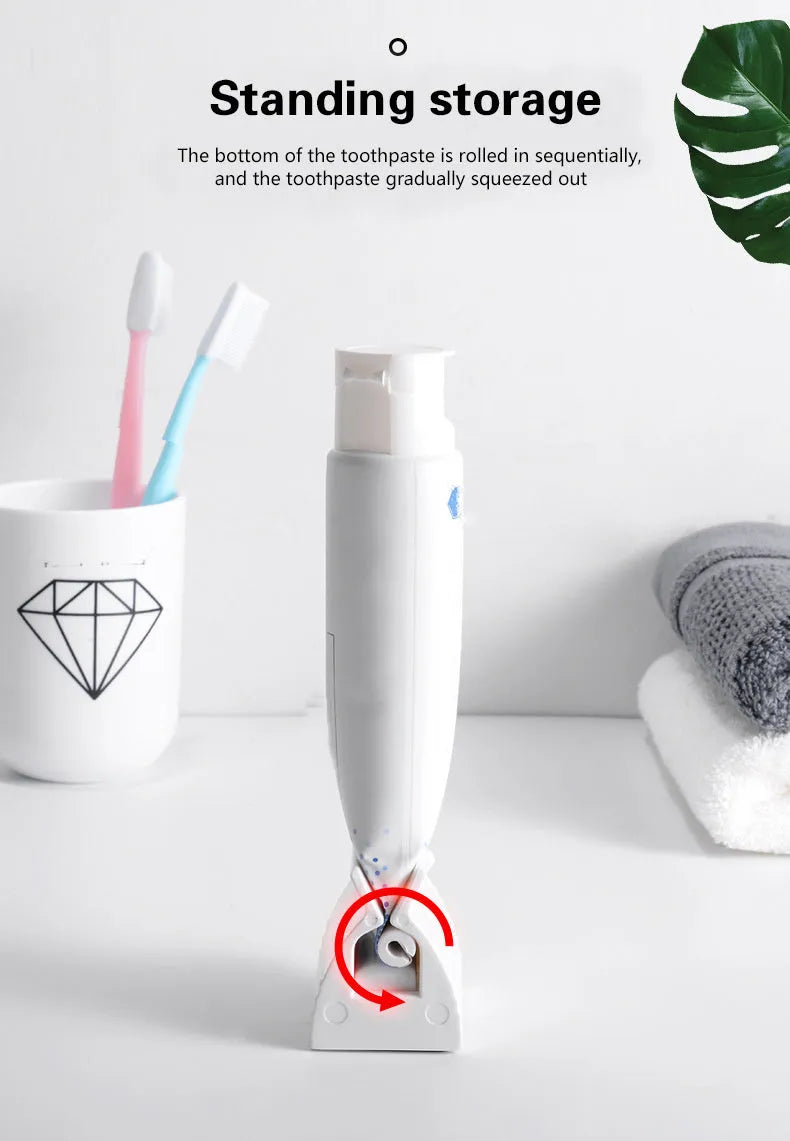 Large toothpaste squeezer in white ABS plastic with a toothpaste tube inserted