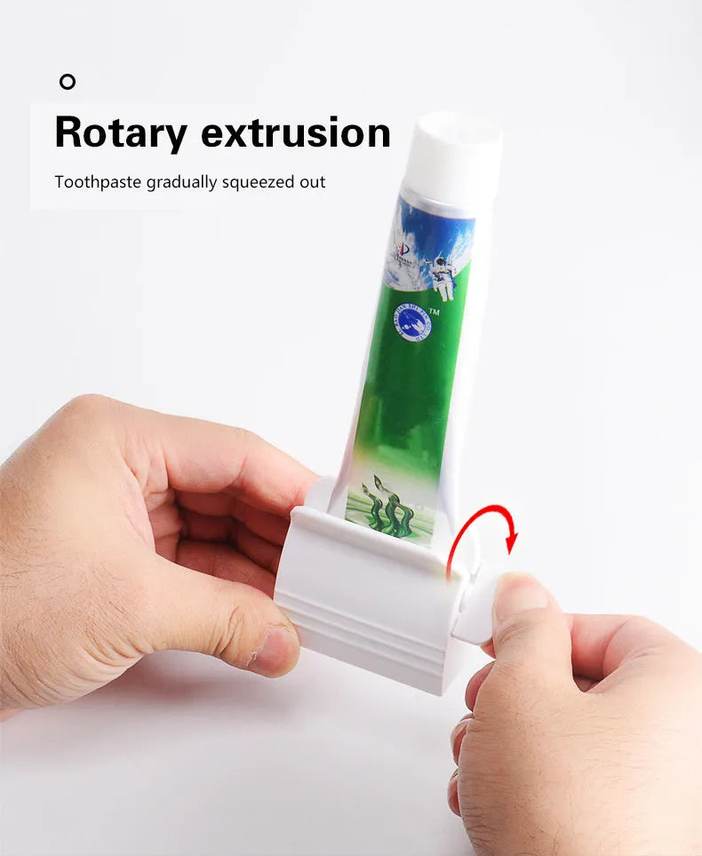 Large toothpaste squeezer in white ABS plastic with a toothpaste tube inserted