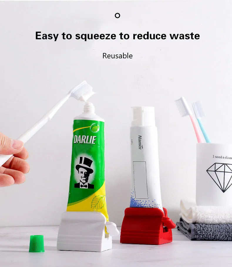 Large toothpaste squeezer in white ABS plastic with a toothpaste tube inserted