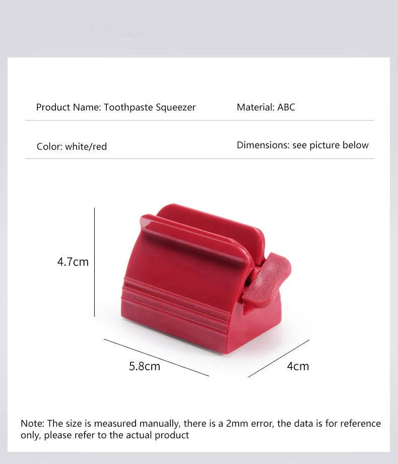 Large toothpaste squeezer in white ABS plastic with a toothpaste tube inserted