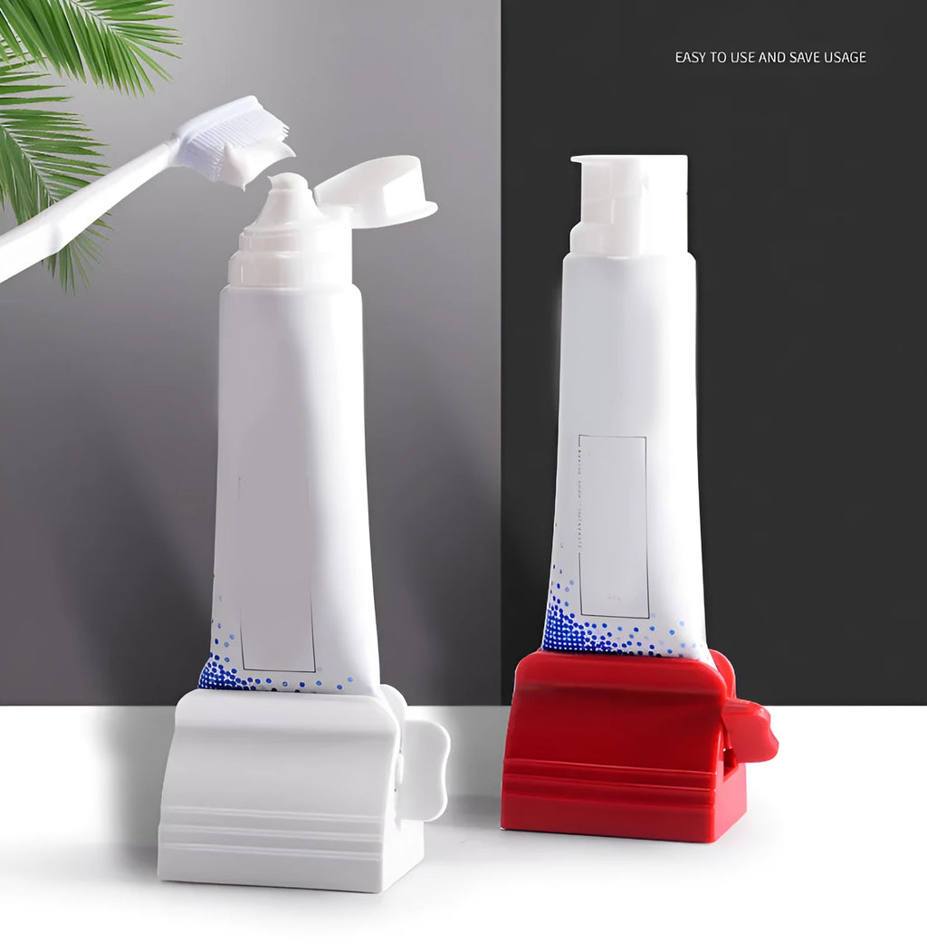 Large toothpaste squeezer in white ABS plastic with a toothpaste tube inserted