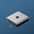 Haibeisi HDMI 2 input 1 output video switcher splitter device with grey casing and multiple HDMI ports