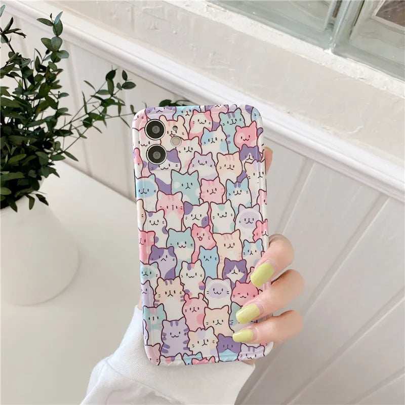 Clear TPU iPhone case with colourful cartoon design, shown fitted on an iPhone.