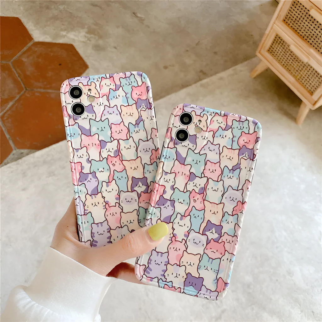 Clear TPU iPhone case with colourful cartoon design, shown fitted on an iPhone.