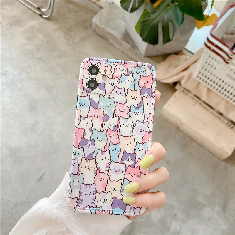 Clear TPU iPhone case with colourful cartoon design, shown fitted on an iPhone.
