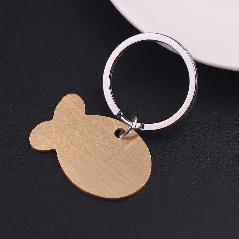 Personalised engraved stainless steel bone-shaped pet ID tag keychain in gold finish for cat or dog collar