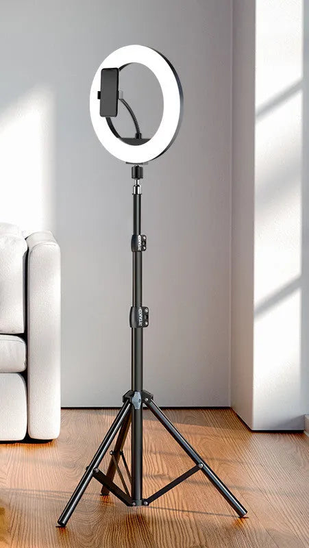 Carbon alloy steel phone tripod with a ring light, shown extended to its full height.