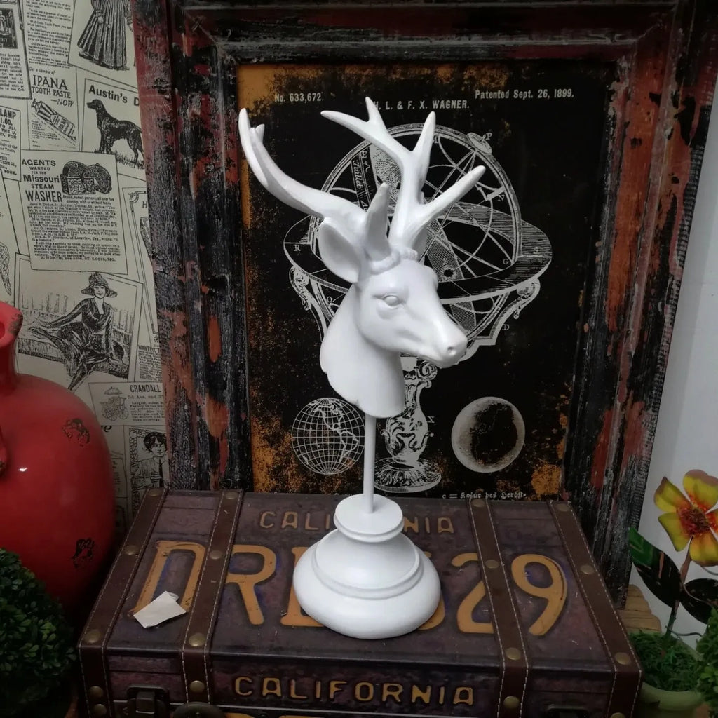 Natural resin animal home decoration sculpture in black, white, or wood colour, 32 cm tall.