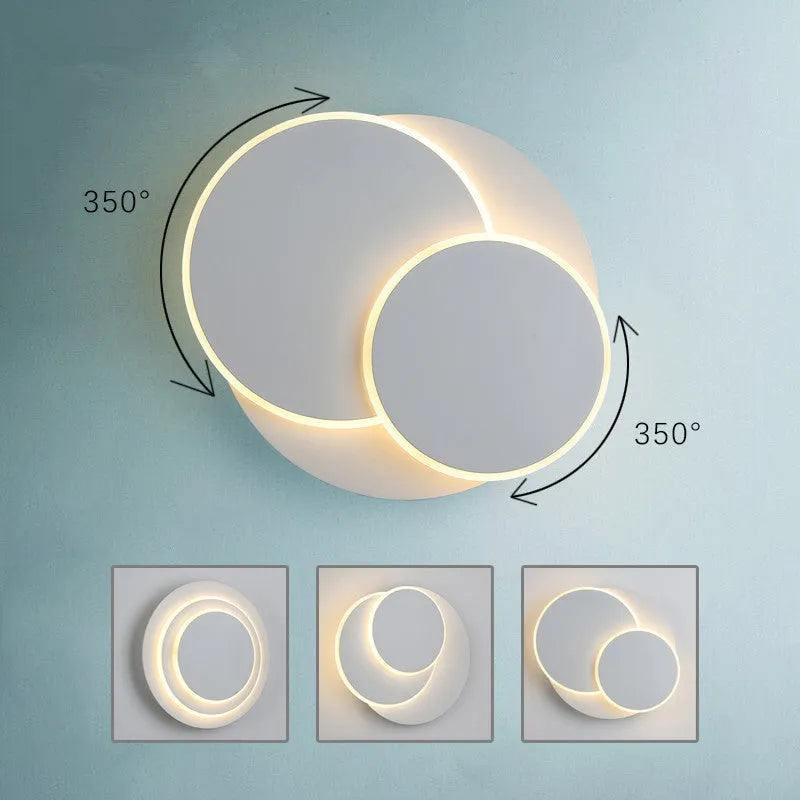 Round acrylic LED wall lamp in black or white with push button switch