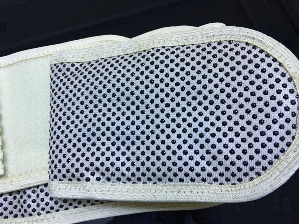 Self-heating magnetic waist protection belt in elastic cloth shown in black colour