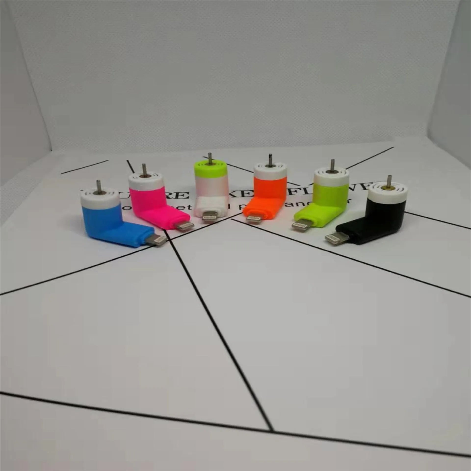 Portable smartphone mini fan in six colours showing USB connector and plastic blades