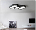 Geometric shaped iron wall light with remote control for dimming and colour changing