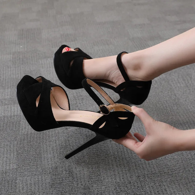 Black women's stiletto sandals with fish mouth toe opening and Roman style platform design