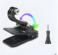 Black 360-degree rotating backpack clip mount for GoPro and action cameras, showing aluminium alloy and ABS construction.