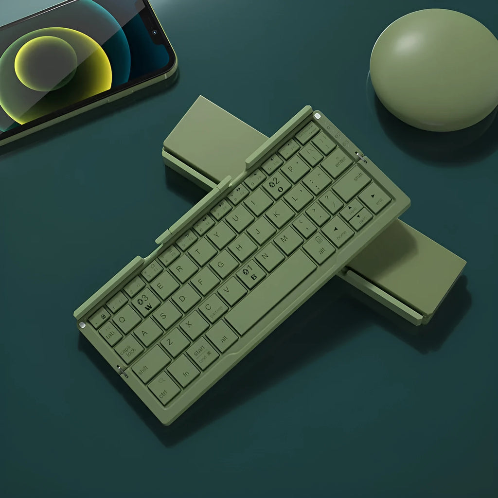 Silver white folding Bluetooth keyboard open with phone on stand and closed showing compact size