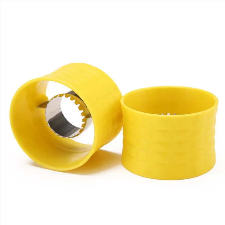 Yellow manual corn thresher with corn-shaped design and stainless steel gear for peeling kernels.