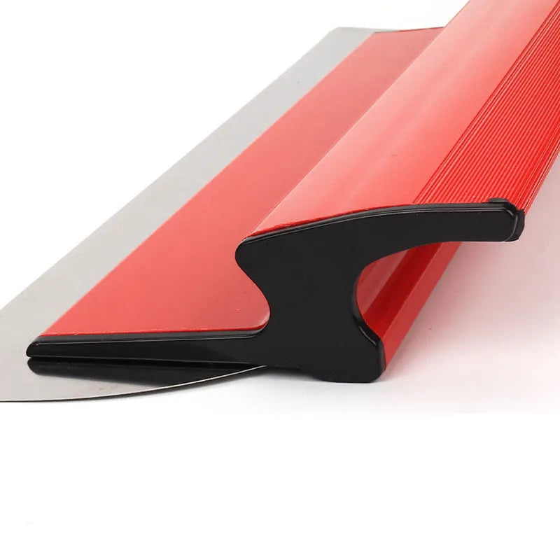 Red 40cm long steel levelling scraper tool for wall putty and wallpaper.