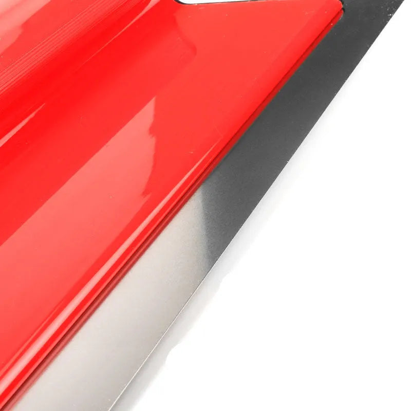 Red 40cm long steel levelling scraper tool for wall putty and wallpaper.