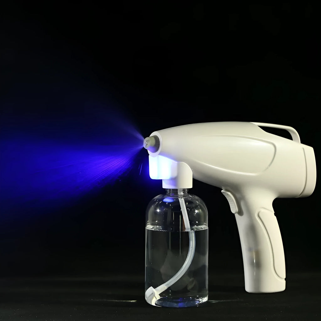 White handheld wireless electric disinfection spray gun with USB-C charging port.