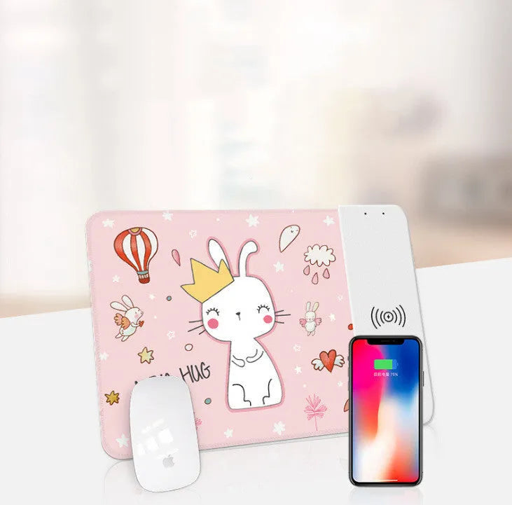 Wireless charging mouse pad with cartoon design showing RGB lighting and USB cable connection