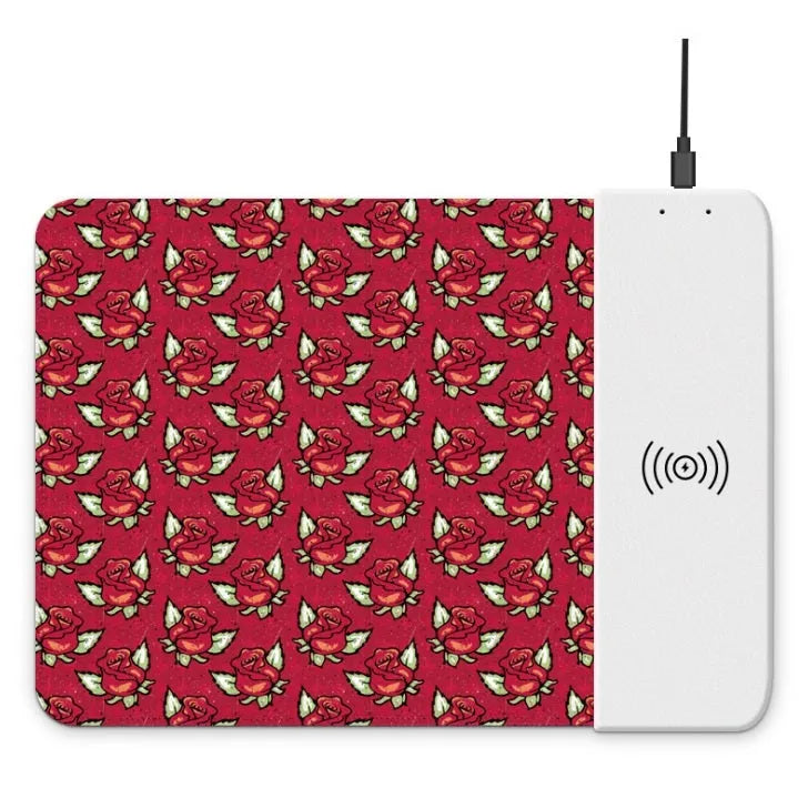 Wireless charging mouse pad with cartoon design showing RGB lighting and USB cable connection