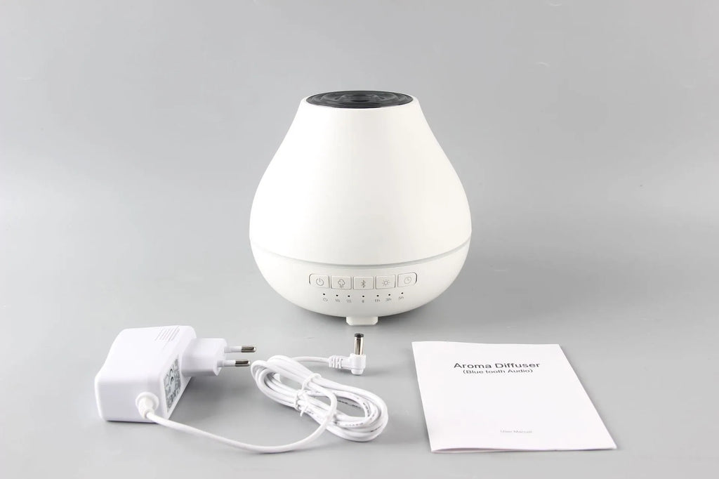 White round Bluetooth humidifier and essential oil aroma diffuser with night light