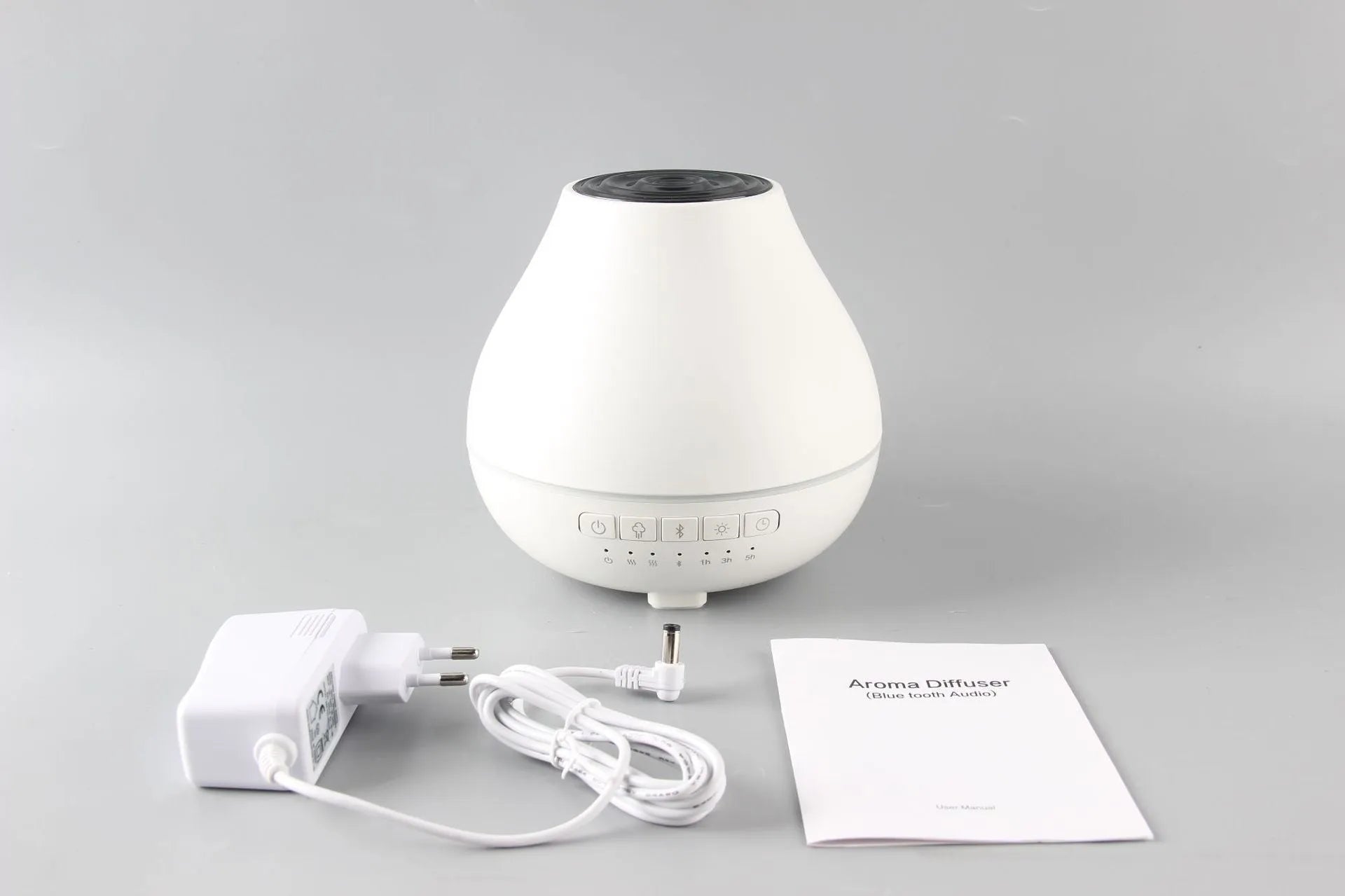 White round Bluetooth humidifier and essential oil aroma diffuser with night light
