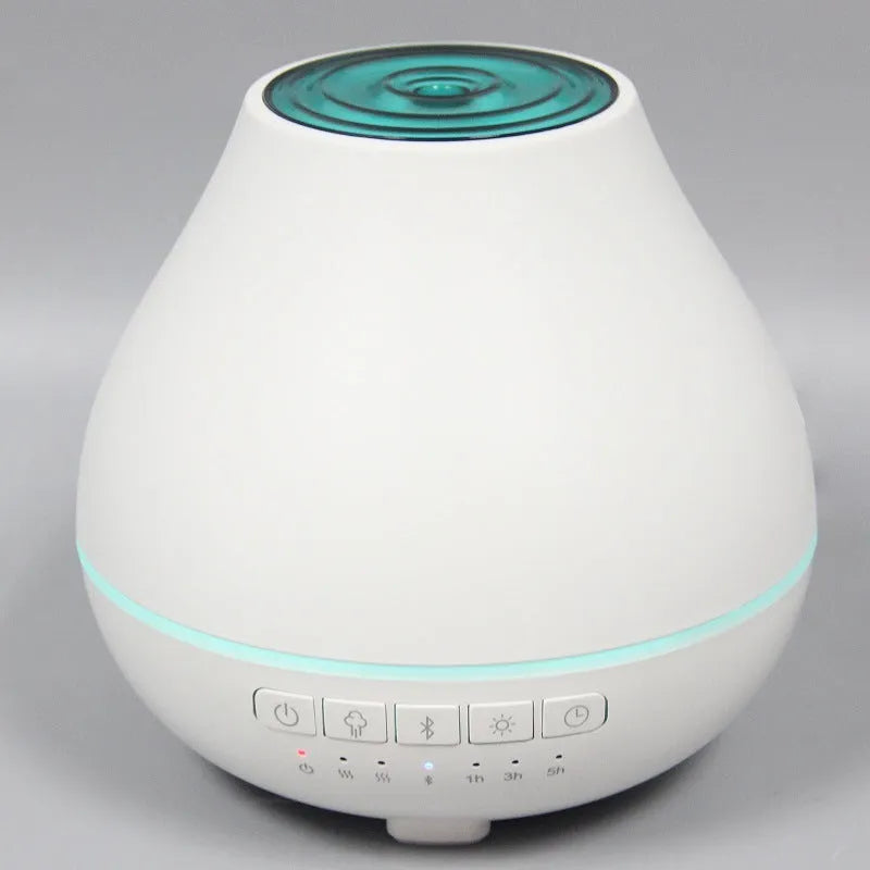 White round Bluetooth humidifier and essential oil aroma diffuser with night light