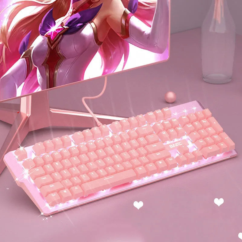 Pink mechanical keyboard and wired mouse gaming peripheral set on desk