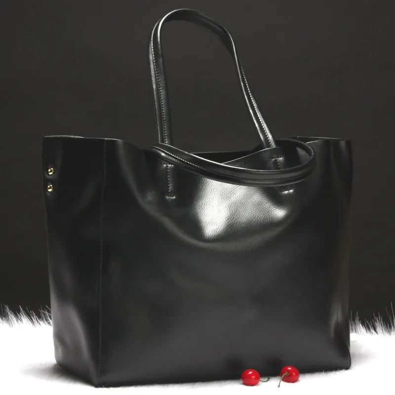 Women's cowhide leather shoulder bag shown in multiple colours with adjustable strap.