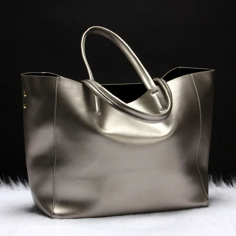 Women's cowhide leather shoulder bag shown in multiple colours with adjustable strap.