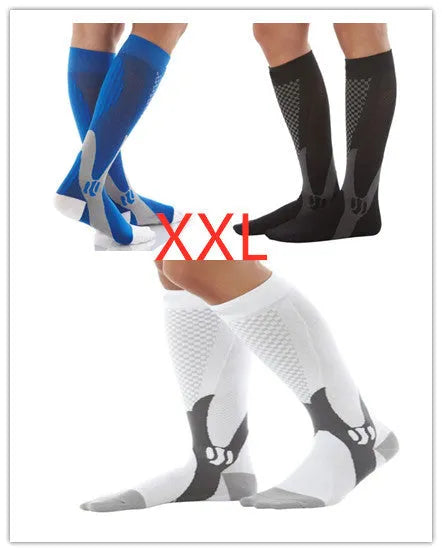 Graduated compression socks for men and women in black, shown laid flat.