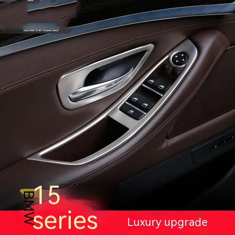 Black ABS and stainless steel interior handle trim strips for BMW 5 Series F10/F1 models, four-piece set.