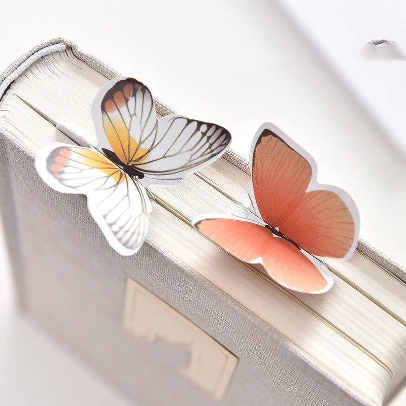 A paper butterfly bookmark measuring 13.5 by 5.5 centimetres.