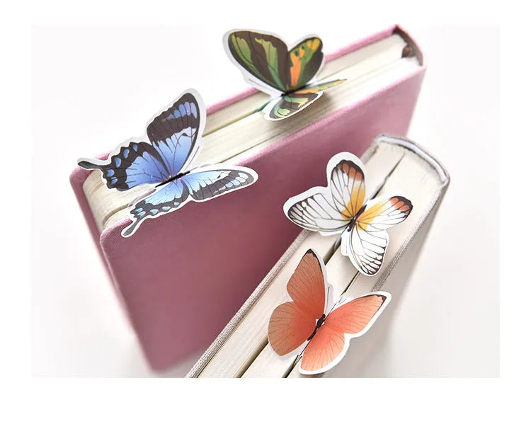 A paper butterfly bookmark measuring 13.5 by 5.5 centimetres.