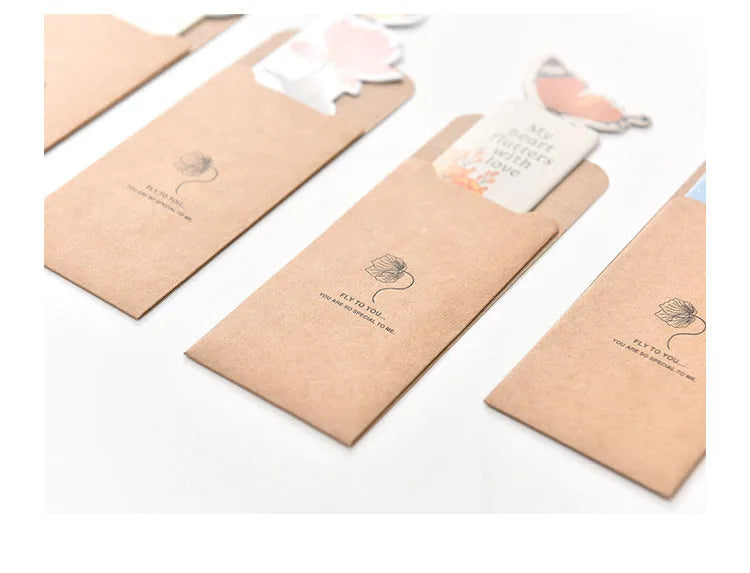 A paper butterfly bookmark measuring 13.5 by 5.5 centimetres.