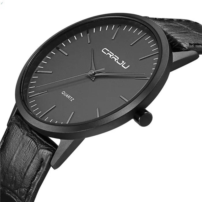 Casual quartz wristwatch with alloy case and choice of black or gold mesh or leather strap.