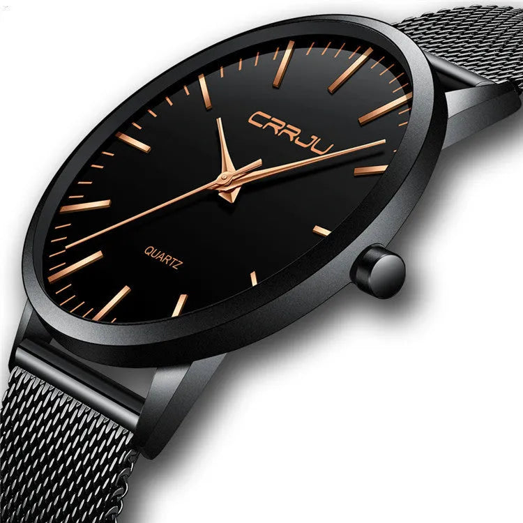 Casual quartz wristwatch with alloy case and choice of black or gold mesh or leather strap.