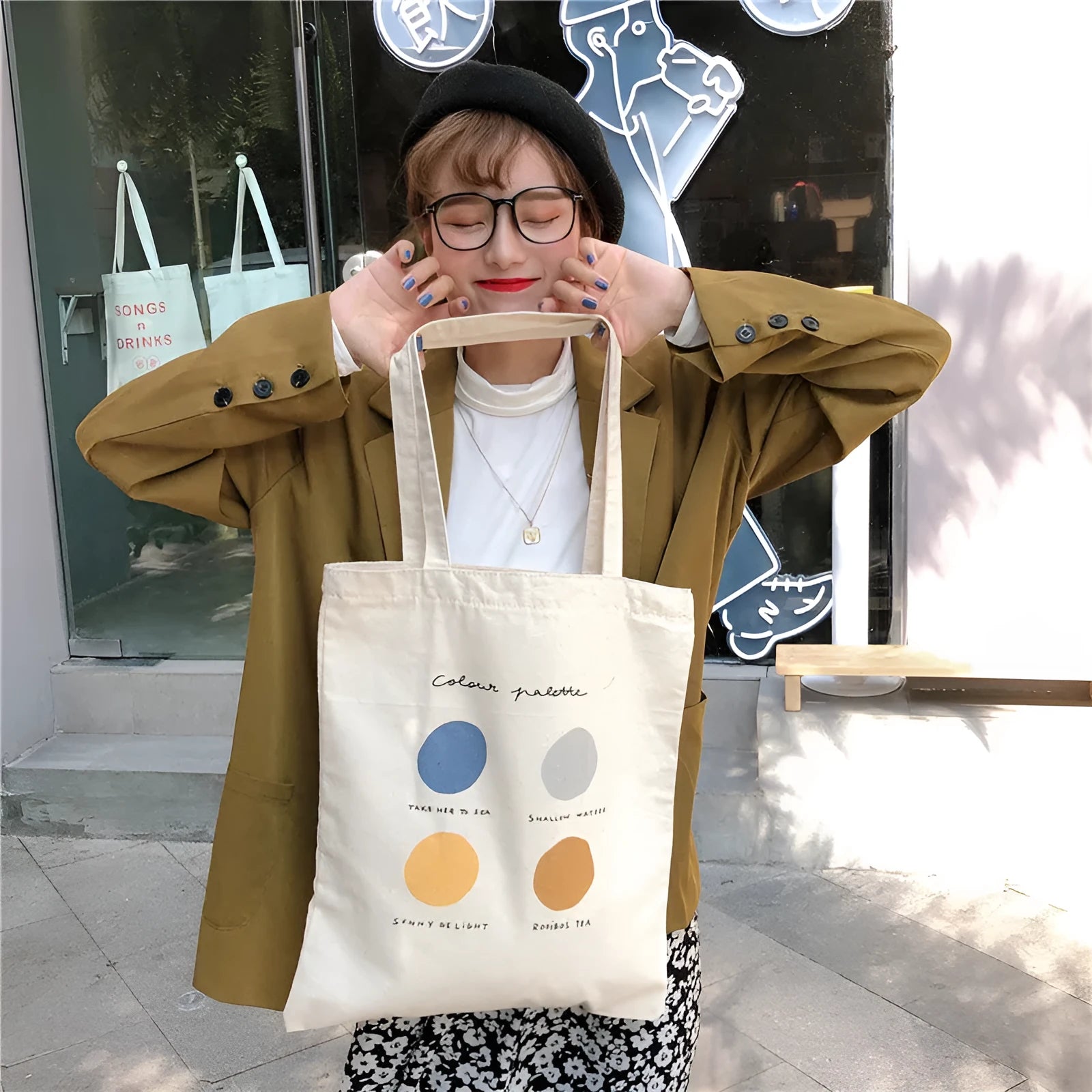 Women's canvas tote shopper bag with geometric pattern, shoulder straps, and zipper closure in orange or light pink colour