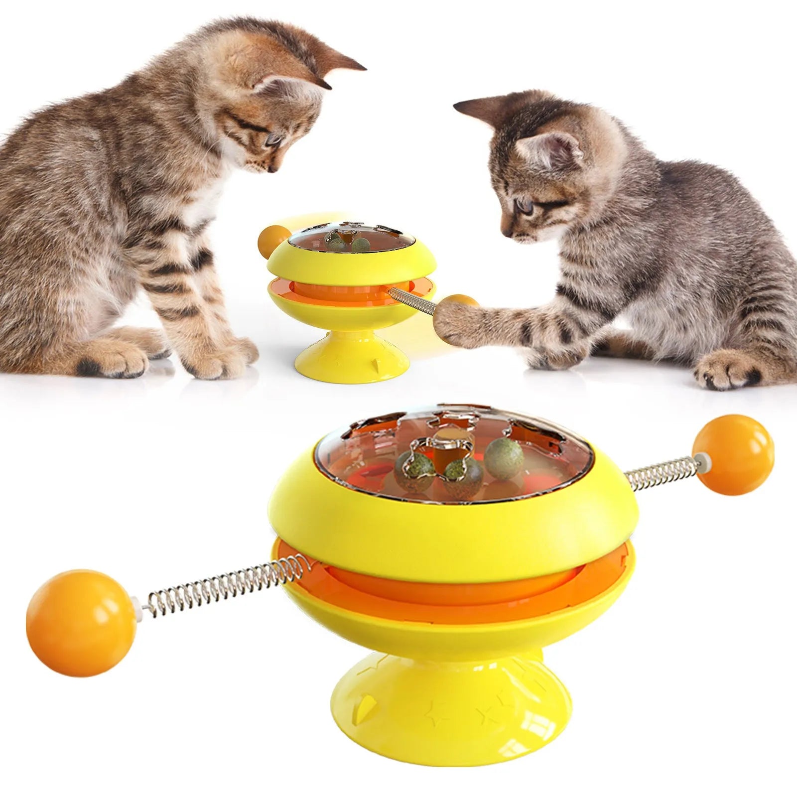 Rotatable interactive cat toy with coloured turntable, transparent top with catnip balls, and a large suction cup base.