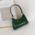 Small square baguette underarm bag in multiple pattern options including animal prints and solid colours
